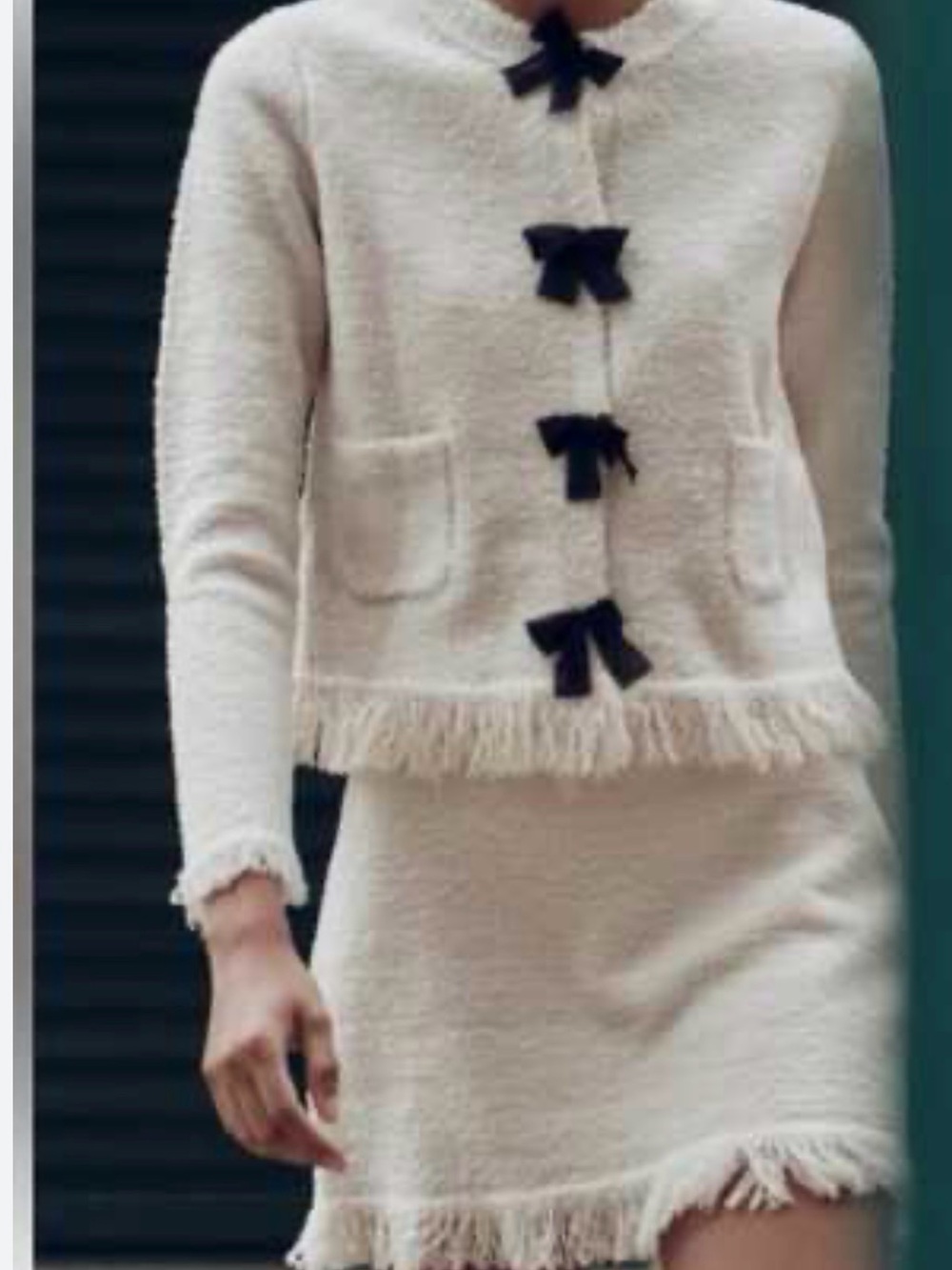 Zara Cream Bouclé Jacket with Black Bow Closures and mini skirt